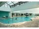 Indoor pool with fountain and ample seating at 1501 S Ocean Blvd. # 330, Myrtle Beach, SC 29577