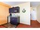 Small kitchenette with microwave, coffee maker, and sink at 1501 S Ocean Blvd. # 330, Myrtle Beach, SC 29577