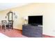 Living room with TV stand and dresser; nicely decorated at 1501 S Ocean Blvd. # 330, Myrtle Beach, SC 29577