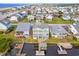 Aerial view of the property and surrounding neighborhood, showcasing its waterfront location at 108 Burlington St. W, Holden Beach, NC 28462