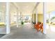 Relaxing covered patio area with seating and a swing at 108 Burlington St. W, Holden Beach, NC 28462