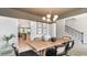Open concept dining room with a view into the kitchen and living areas at 1889 Brook Park Pl., Conway, SC 29526