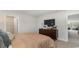 Relaxing bedroom with dresser and access to a shared bathroom at 1889 Brook Park Pl., Conway, SC 29526