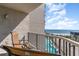 Balcony view of the ocean, pool, and surrounding buildings at 200 76Th Ave. N # 511, Myrtle Beach, SC 29577