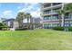 Expansive grassy area next to the building, ideal for relaxing at 200 76Th Ave. N # 511, Myrtle Beach, SC 29577