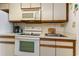 Small kitchen with microwave, oven, and stovetop at 200 76Th Ave. N # 511, Myrtle Beach, SC 29577