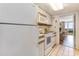 Small kitchen with white appliances and ocean view at 200 76Th Ave. N # 511, Myrtle Beach, SC 29577