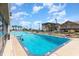 Large outdoor pool with plenty of room for swimming and sunbathing at 200 76Th Ave. N # 511, Myrtle Beach, SC 29577
