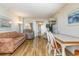 Living room with sofa, table, and access to balcony at 200 76Th Ave. N # 511, Myrtle Beach, SC 29577