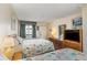 Bedroom with two double beds, TV, and ocean view at 200 76Th Ave. N # 511, Myrtle Beach, SC 29577