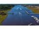 Aerial view of waterfront community with boats and docks at 3539 Rayner Cove Ct., Little River, SC 29566