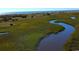 Aerial view of waterfront property with marsh and creek at 3539 Rayner Cove Ct., Little River, SC 29566