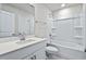 Clean bathroom with a white vanity, bathtub, and shower at 3539 Rayner Cove Ct., Little River, SC 29566