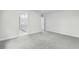 Bedroom with gray carpet, access to bathroom and hallway at 3539 Rayner Cove Ct., Little River, SC 29566