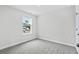 Spacious bedroom with carpeted flooring and a window with blinds at 3539 Rayner Cove Ct., Little River, SC 29566