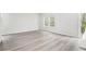 Spacious dining room with light hardwood floors and access to patio at 3539 Rayner Cove Ct., Little River, SC 29566