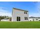 House exterior, light gray vinyl siding, sliding glass door at 3539 Rayner Cove Ct., Little River, SC 29566