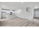 Open concept kitchen with island and white cabinets at 3539 Rayner Cove Ct., Little River, SC 29566