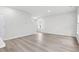 Bright and spacious living room with light hardwood floors and plenty of natural light at 3539 Rayner Cove Ct., Little River, SC 29566