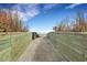 Wooden boardwalk leads to a sandy beach with ocean views at 6001 S Kings Hwy., Myrtle Beach, SC 29575