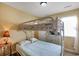 Bedroom with a bunk bed and light blue bedding at 6001 S Kings Hwy., Myrtle Beach, SC 29575