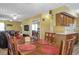 Dining area with adjacent kitchen and living room at 6001 S Kings Hwy., Myrtle Beach, SC 29575