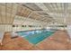Relaxing indoor pool area with high ceilings and plenty of seating at 6001 S Kings Hwy., Myrtle Beach, SC 29575