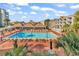 Resort-style pool with plenty of lounge chairs at 6803 N Ocean Blvd. # 230, Myrtle Beach, SC 29572