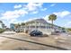 Exterior view of a two-story building with parking at 6803 N Ocean Blvd. # 230, Myrtle Beach, SC 29572