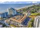 Aerial view showing a complex near the beach with a pool and parking at 6803 N Ocean Blvd. # 230, Myrtle Beach, SC 29572