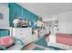 Main bedroom with coral bedding, teal accents, and open layout at 6803 N Ocean Blvd. # 230, Myrtle Beach, SC 29572