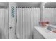 Simple bathroom with white vanity and shower at 6803 N Ocean Blvd. # 230, Myrtle Beach, SC 29572