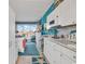 White kitchen with a breakfast bar and ocean view at 6803 N Ocean Blvd. # 230, Myrtle Beach, SC 29572