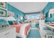 Coastal-themed bedroom with a queen bed and balcony access at 6803 N Ocean Blvd. # 230, Myrtle Beach, SC 29572