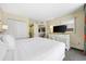 King-size bed, dresser, and ensuite bathroom access at 2301 Ocean Blvd. S # 1218, Myrtle Beach, SC 29577