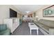 Open living space with a view into the kitchen and dining area at 2301 Ocean Blvd. S # 1218, Myrtle Beach, SC 29577