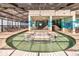 Indoor hot tub and pool area with fun ocean mural at 2301 Ocean Blvd. S # 1218, Myrtle Beach, SC 29577