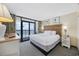 King-size bed, ocean view, and private balcony access at 2301 Ocean Blvd. S # 1218, Myrtle Beach, SC 29577