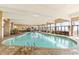 Indoor pool with large windows offering ocean views at 2301 Ocean Blvd. S # 1218, Myrtle Beach, SC 29577