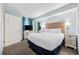 Comfortable bedroom with a king-size bed and a flat-screen TV at 2301 Ocean Blvd. S # 1218, Myrtle Beach, SC 29577