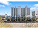 Oceanfront resort building with parking and palm trees at 2301 Ocean Blvd. S # 1218, Myrtle Beach, SC 29577