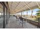 Relaxing oceanview patio with tables and chairs at 7100 N Ocean Blvd. # 913, Myrtle Beach, SC 29572