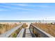 Convenient beach access walkway leading to the ocean at 7100 N Ocean Blvd. # 913, Myrtle Beach, SC 29572
