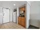 Small kitchen with refrigerator, microwave, and cabinets at 7100 N Ocean Blvd. # 913, Myrtle Beach, SC 29572