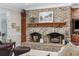 Double-sided brick fireplace is a focal point at 4400 Saint Andrews Ct., Murrells Inlet, SC 29576
