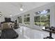 Sunroom with backyard view and exercise equipment at 4400 Saint Andrews Ct., Murrells Inlet, SC 29576