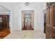 Elegant entryway with high ceilings, hardwood floors, and crown molding at 4400 Saint Andrews Ct., Murrells Inlet, SC 29576