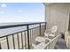 Balcony with two chairs and ocean view at 1501 Ocean Blvd. S # 1140, Myrtle Beach, SC 29577