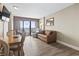 Living room with ocean view, sofa, and dining area at 1501 Ocean Blvd. S # 1140, Myrtle Beach, SC 29577