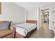 Bedroom with a fold-out bed and access to the hallway at 1501 Ocean Blvd. S # 1140, Myrtle Beach, SC 29577